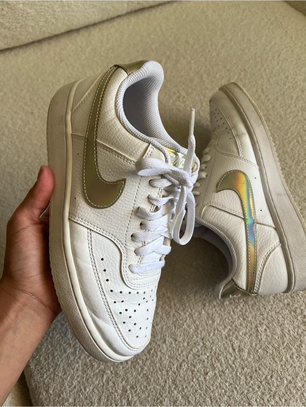 Nike Women’s White Sneakers with Iridescent Gold Swoosh